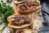 Tender Slow Cooker French Dip Sandwiches
