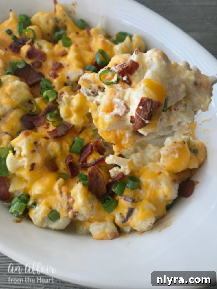 Delicious Loaded Cauliflower Casserole, a perfect low-carb alternative to loaded baked potatoes