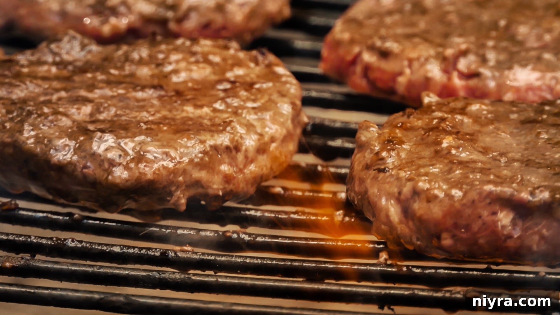 Frank's Kraut: A Griller's Delight 5 Succulent burgers cooking on a hot grill, ready for toppings.