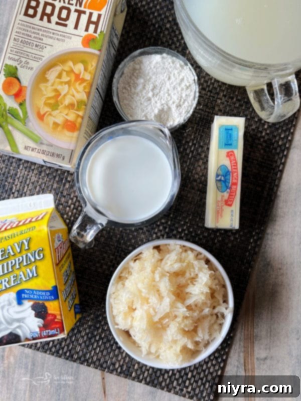 Close-up of creamy sauerkraut soup in a white bowl with a spoon