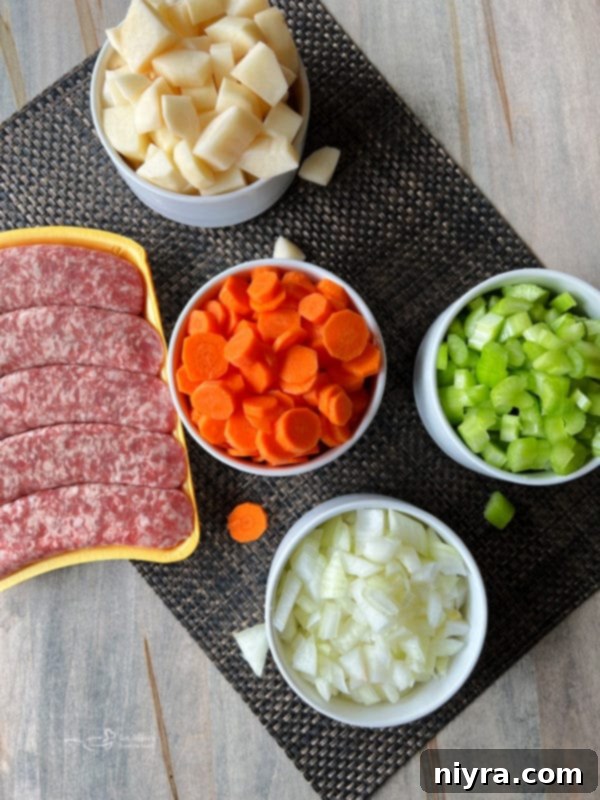 Fresh vegetables and ingredients laid out for making sauerkraut soup
