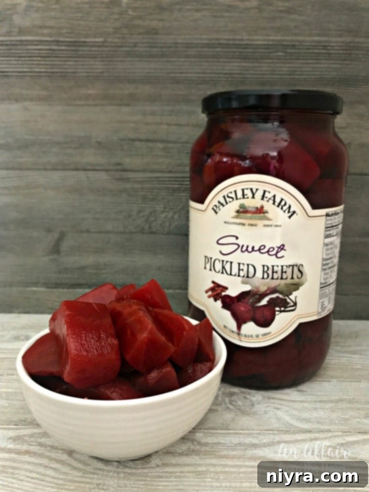 A bowl of Paisley Farm Sweet Pickled Beets, ready for cooking, highlighting their convenience.
