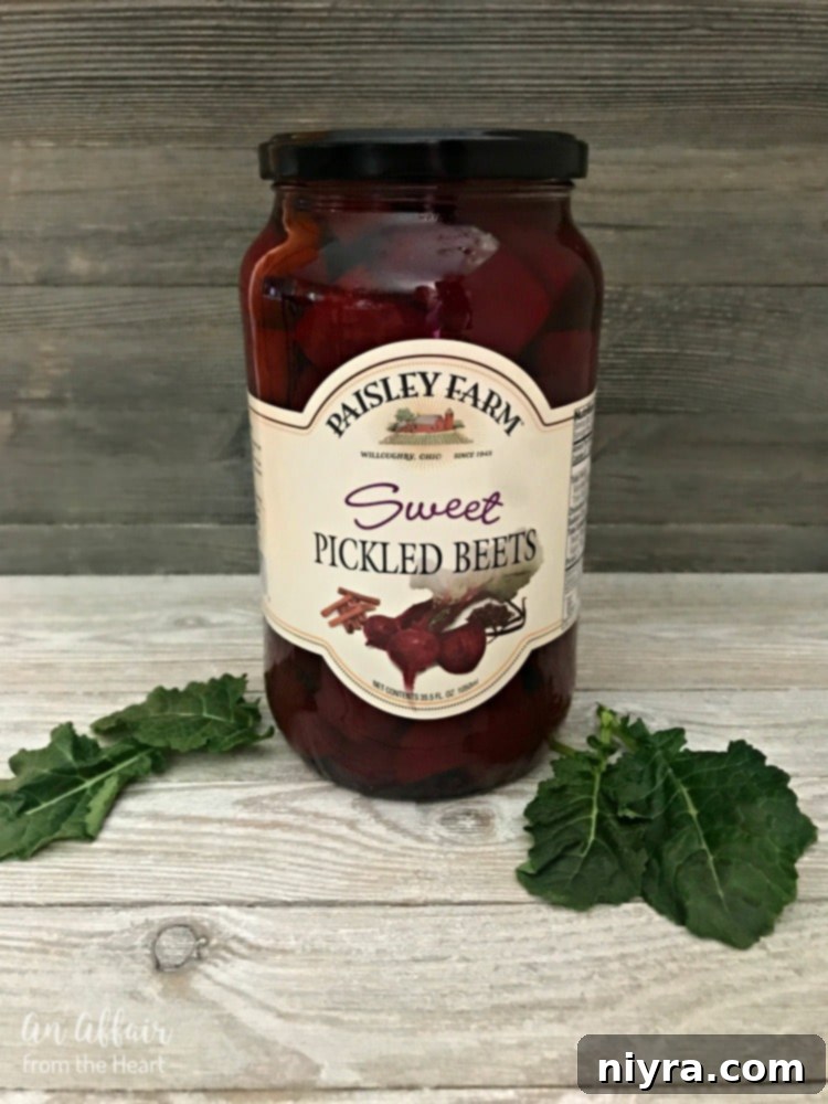 A close-up of a Paisley Farm Sweet Pickled Beets jar, emphasizing the brand's commitment to quality.
