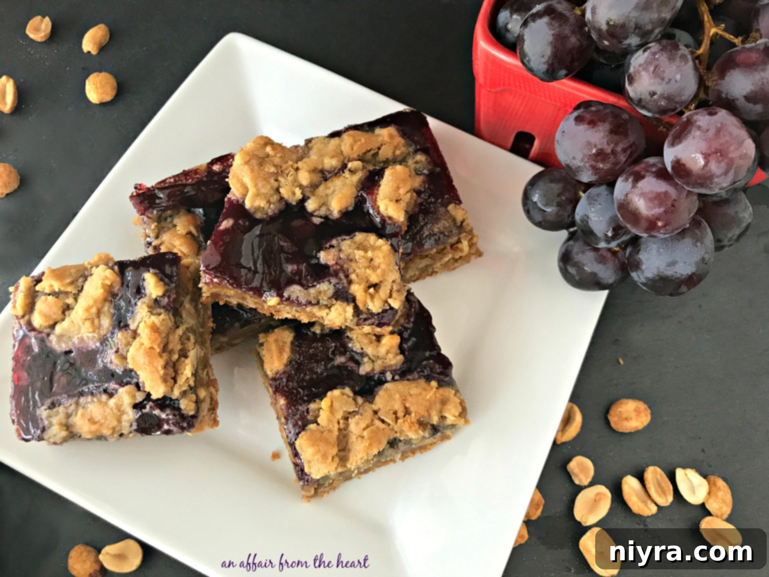 PB&J Oatmeal Cookie Bars arranged on a plate