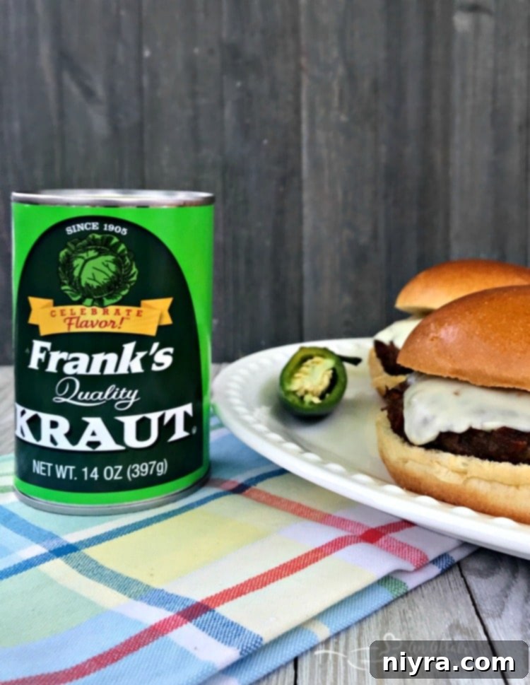 Krautfire Bacon Burger 7 A Spicy Bacon Kraut Burger served on a brioche bun with a side of extra Frank's Kraut.
