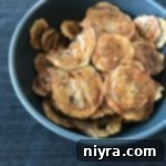 Italian Style Baked Zucchini Chips in a blue bowl