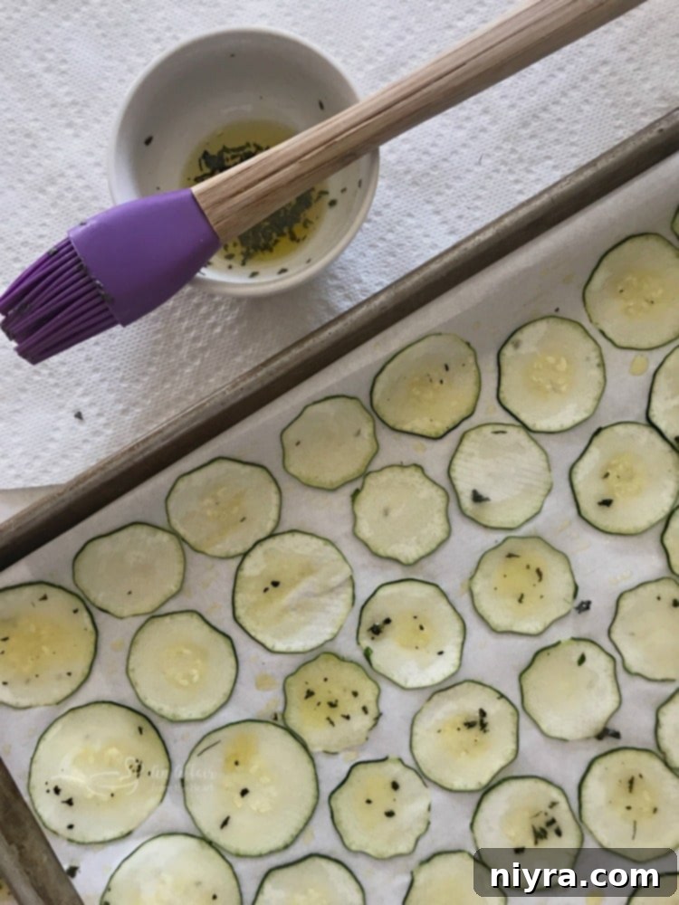 Italian Style Baked Zucchini Chips brushed with oil
