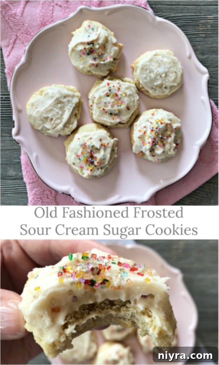 A plate of frosted sour cream sugar cookies, perfectly soft and inviting.