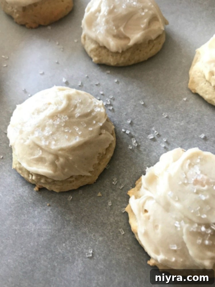 Close-up of Mom's Old Fashioned Sour Cream Sugar Cookies, highlighting the soft texture.