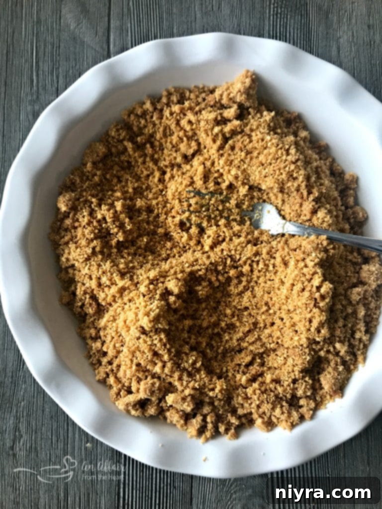 Preparing the graham cracker crust for Banana Cream Pie