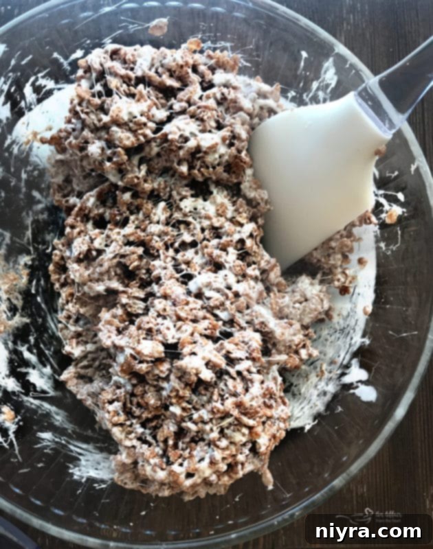 Warm Cocoa Krispies and marshmallow mixture in a bowl