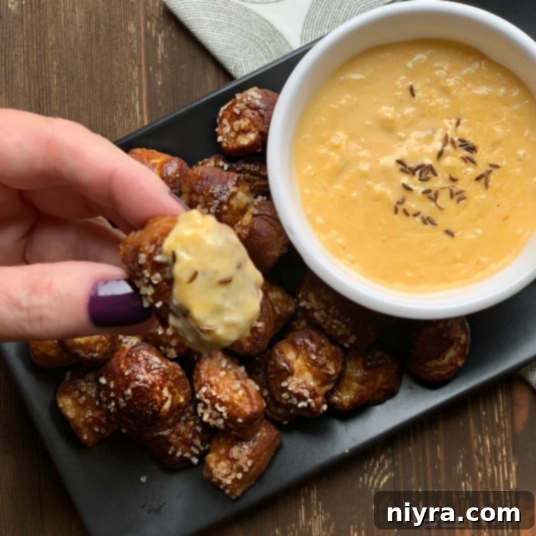 Tangy Kraut Cheddar Pretzel Bites 14 Quick Pretzel Bites with Sauerkraut Cheddar Cheese Sauce dip