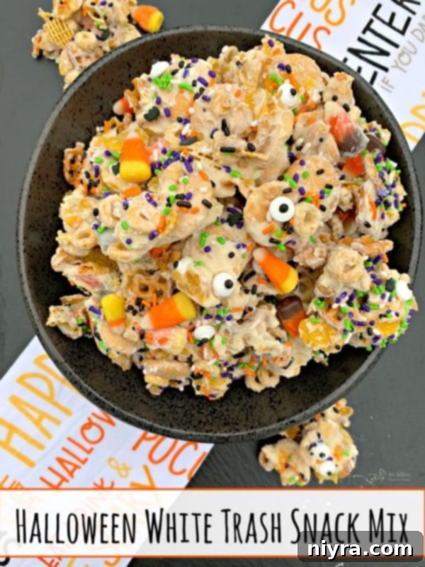 Monster Mash Snack Mix 8 Halloween White Trash Snack Mix - Final festive presentation on a serving platter