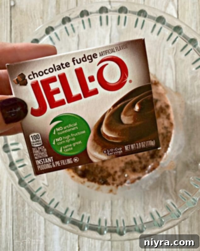 Velvet Chocolate Pudding Frosting 5 Mixing Jell-O instant pudding and milk in a bowl