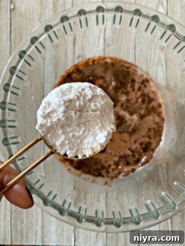 Velvet Chocolate Pudding Frosting 6 Adding powdered sugar to the pudding and milk mixture