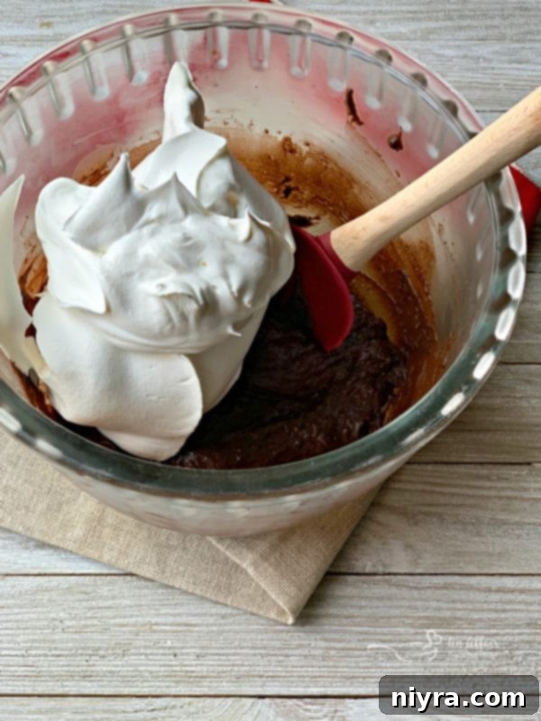 Velvet Chocolate Pudding Frosting 7 Gently folding Cool Whip into the chocolate pudding mixture