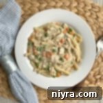 Gary's Easy 20-Minute Chicken and Noodles 14 Gary's 20 Minute Chicken & Noodles in a white bowl