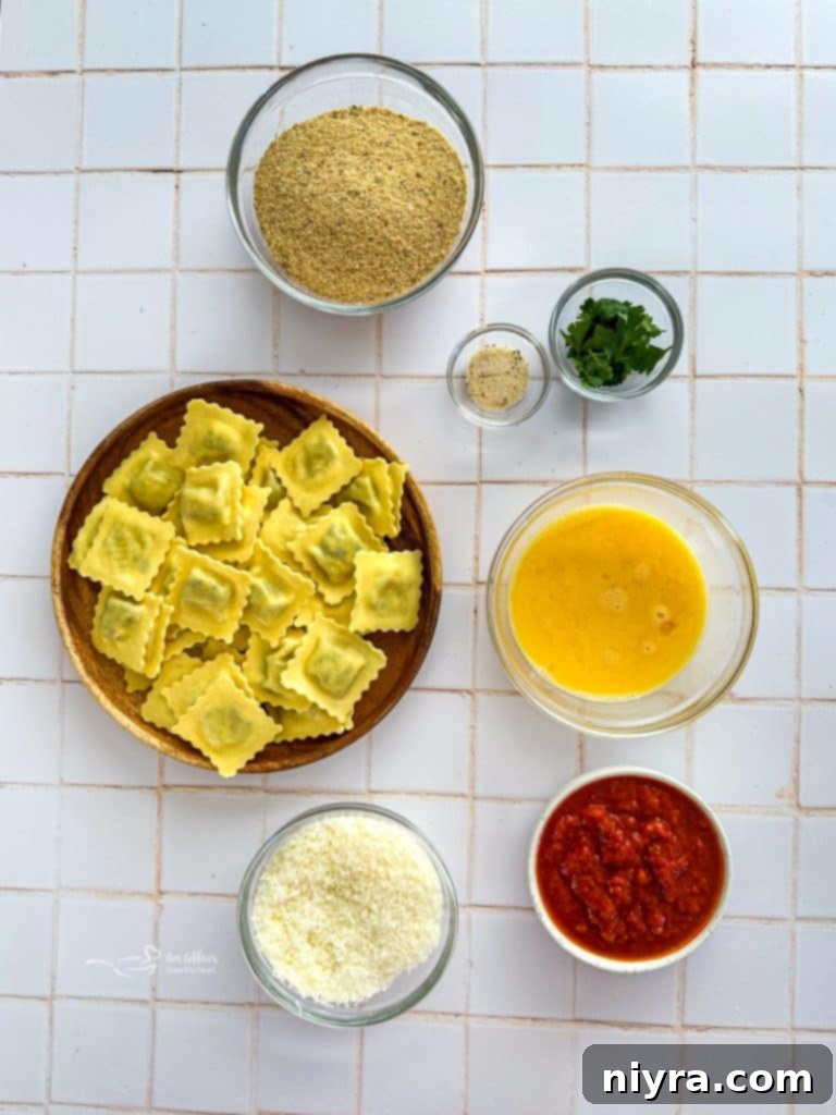 Air Fryer Toasted Ravioli stacked on a white plate, ready for serving.
