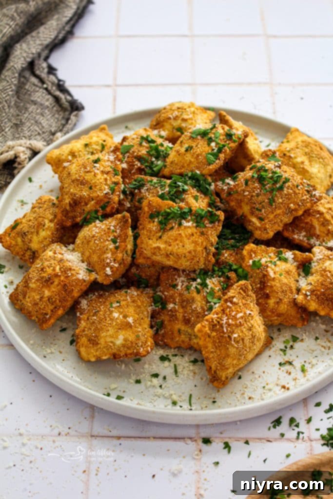 Prepared ingredients for Air Fryer Toasted Ravioli: ravioli, breadcrumbs, egg wash, and marinara.