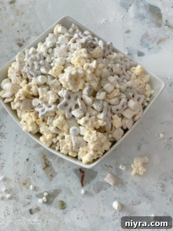 Finished Winter Wonderland Snack Mix in a large bowl, ready for serving