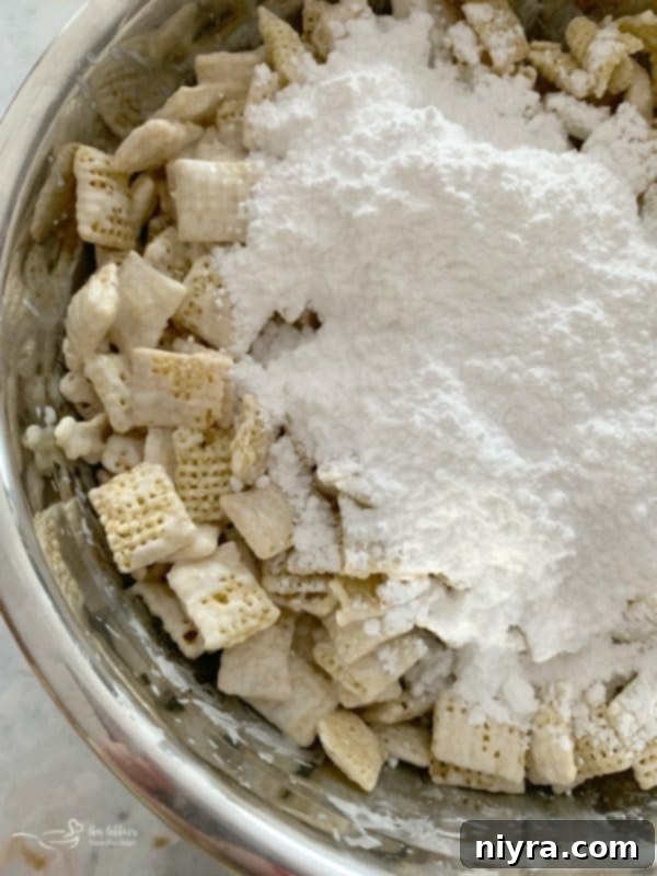 Winter Wonderland Snack Mix with white chocolate-coated Chex cereal, resembling puppy chow