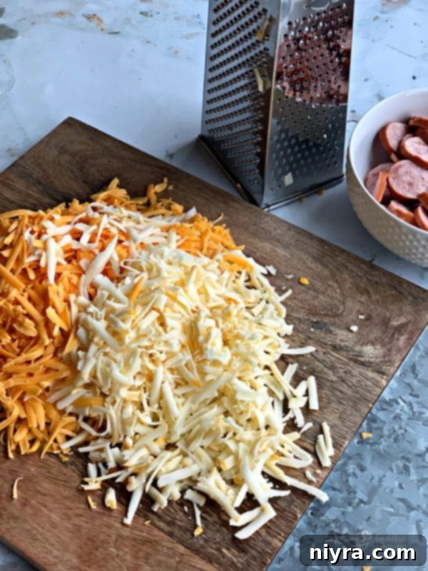 Hearty Instant Pot Beer Cheese Soup with Tangy Kraut and Smoked Kielbasa 6 Shredding cheese for creamy Beer Cheese Soup