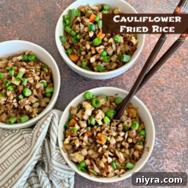 Cauliflower Fried Rice served in a bowl, ready to eat