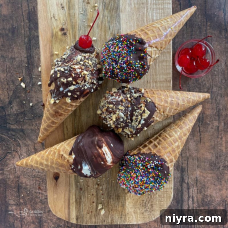 Crafted Kitchen Drumsticks 7 Five homemade chocolate-dipped ice cream cones adorned with nuts and cherries, presented beautifully.