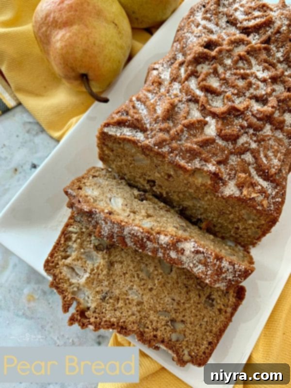 Whole Pear Bread Loaf on a cooling rack