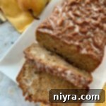 Pear Bread overhead on a white serving plate