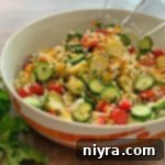 Greek Cauliflower Rice Salad with Brussels Sprouts in a salad bowl