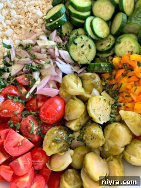 All ingredients for Greek Cauliflower Rice Salad prepped and ready to combine