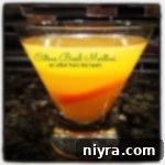 Side view of Citrus Basil Martini with text of the same