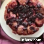 overhead of Blueberry Sweet Rolls on a white serving plate