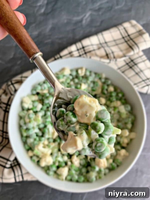 Pea and Cauliflower Medley 4 A spoonful of pea salad with cauliflower