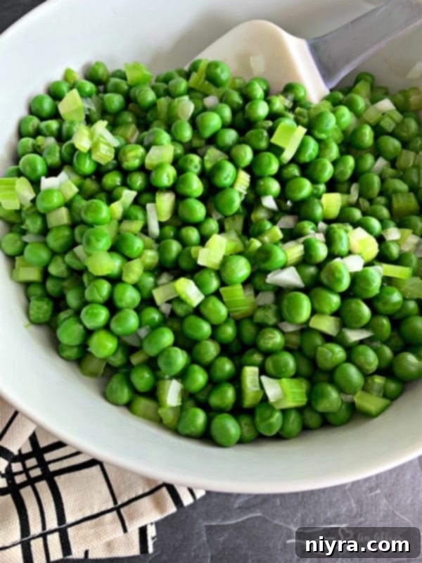Pea and Cauliflower Medley 8 Blanched peas, onion, and celery in a mixing bowl