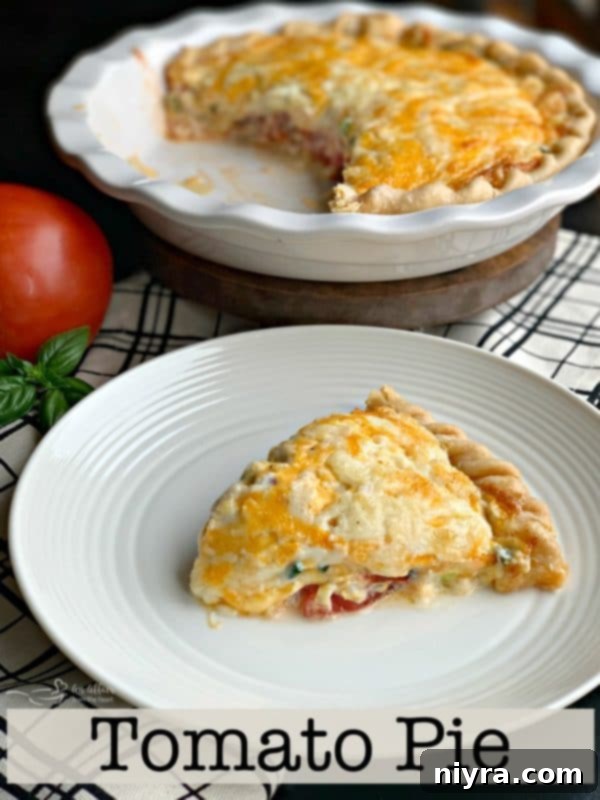 Close-up of a rustic Southern Tomato Pie, highlighting its golden crust and delicious filling