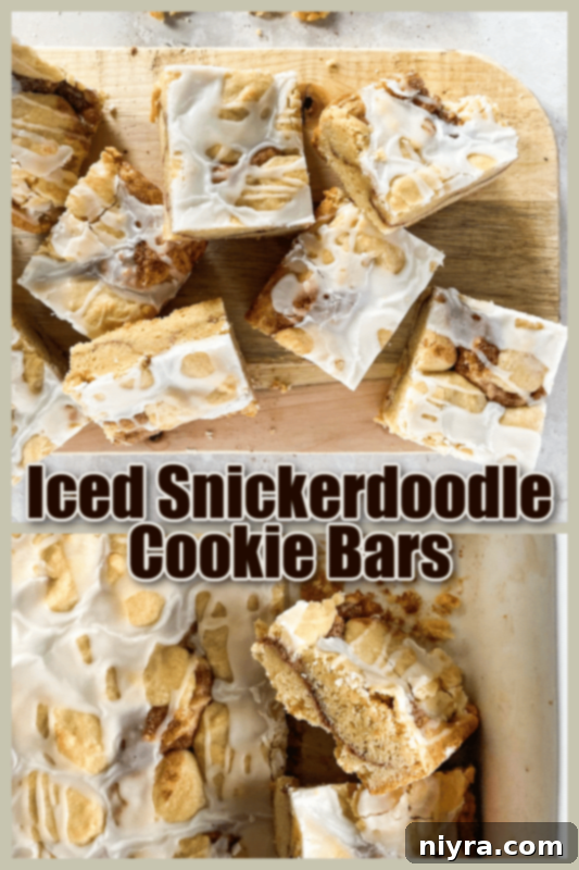 A stack of Iced Snickerdoodle Bars with a light vanilla drizzle, presented on a wooden board.