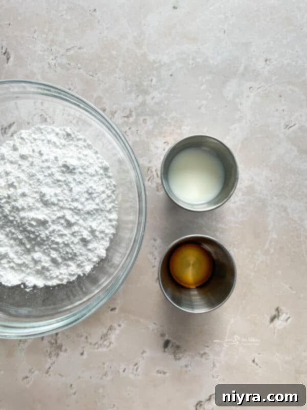 Ingredients for Iced Snickerdoodle Bars laid out on a kitchen counter: flour, butter, sugar, eggs, and cinnamon.