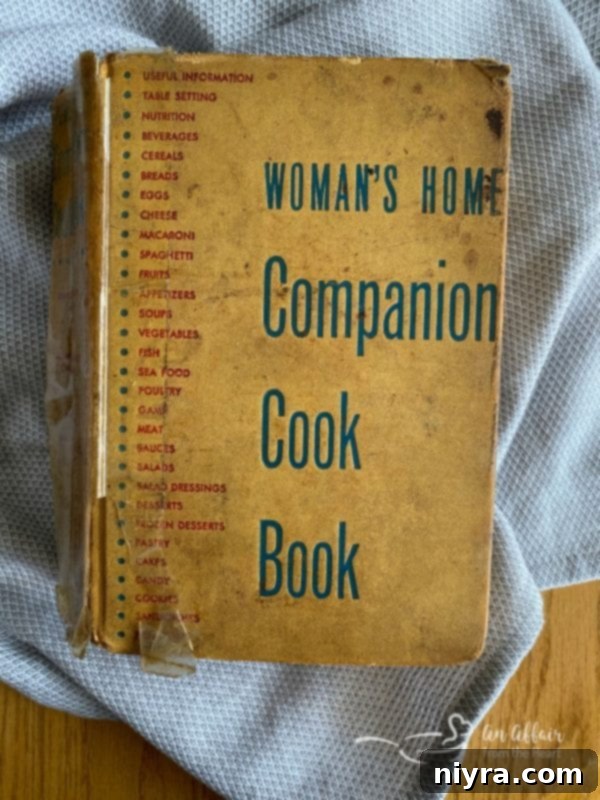 Grandma's vintage cookbook with a worn cover