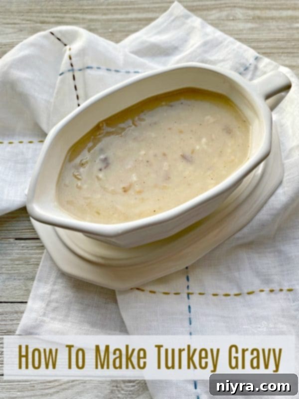 Rich, flavorful homemade turkey gravy in a traditional gravy boat, ready for serving