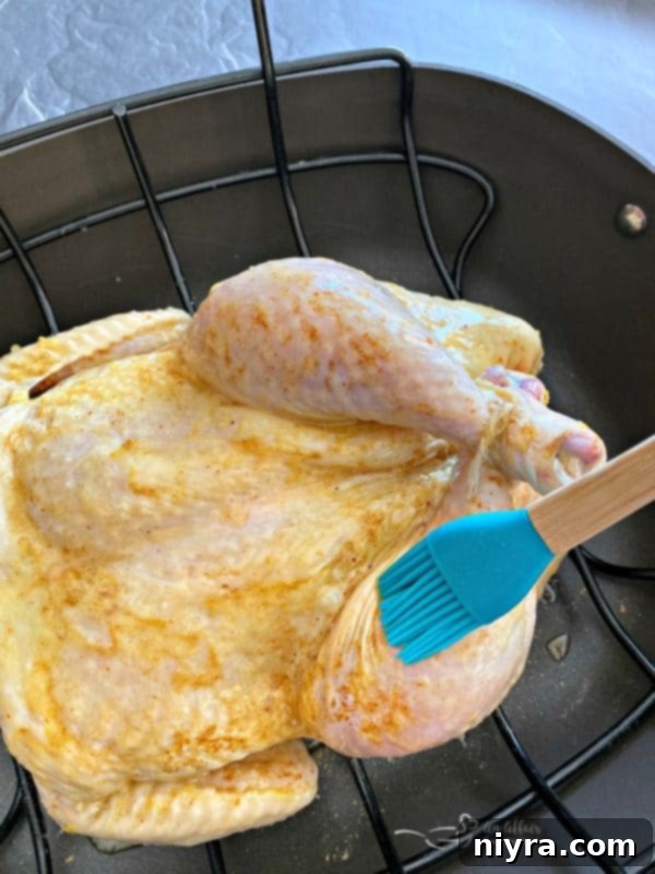 Melted butter ready to brush on Jamaican Jerk Glazed Chicken