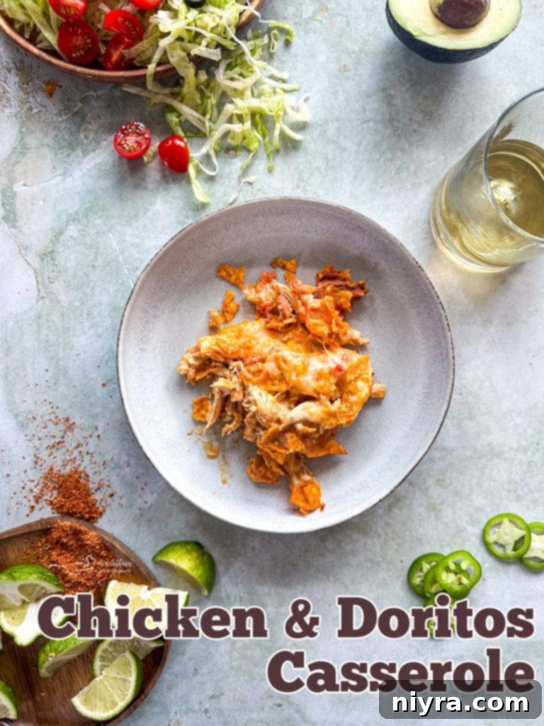 Full baking dish of Chicken and Doritos Casserole, garnished with fresh cilantro.