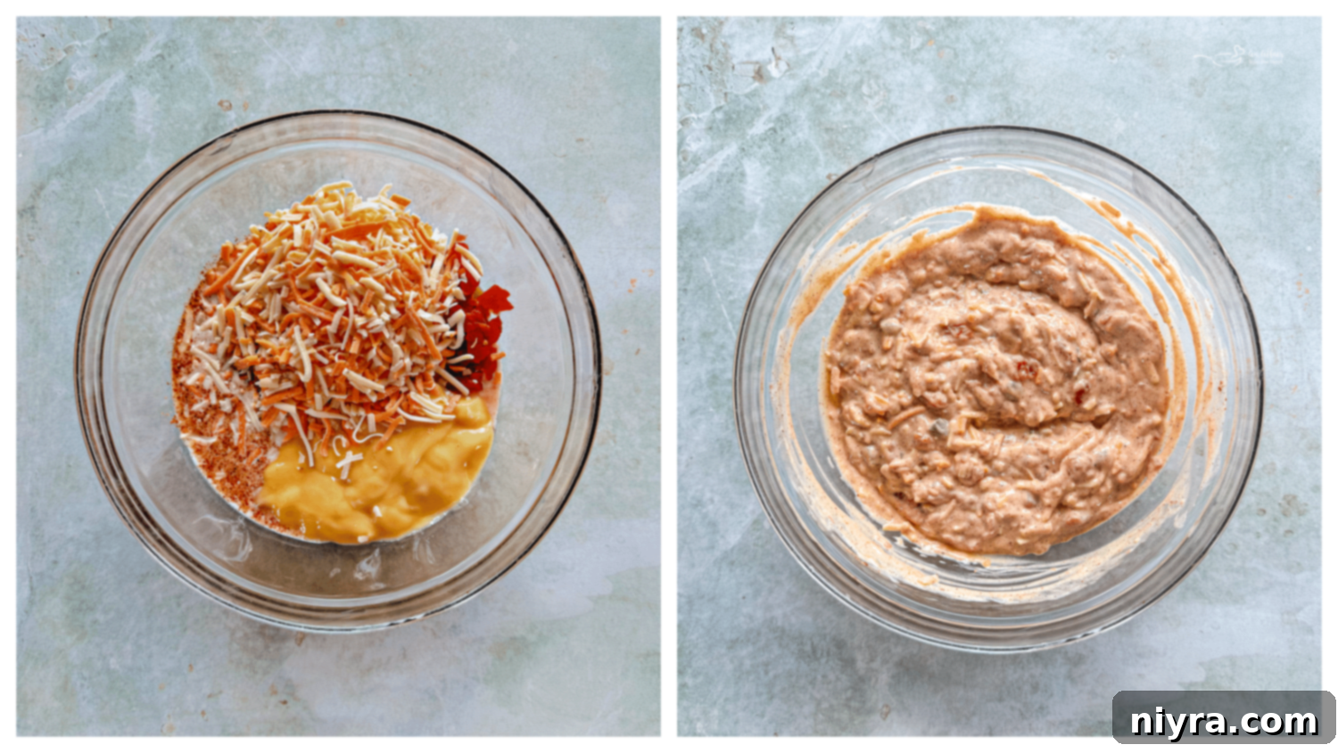 Refried beans spread evenly in the bottom of a baking dish.