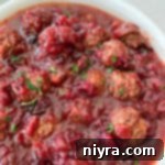 Dorothy's Zesty Cranberry Meatballs 12 Dorothy's Cranberry Meatballs in a bowl