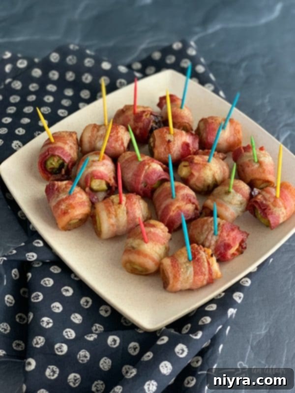 Crispy Bacon Wrapped Hot Brussels Sprouts, a delightful appetizer, presented on a platter