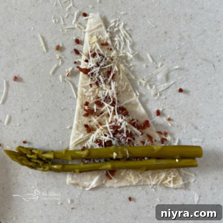 Rolling pickled asparagus in phyllo dough