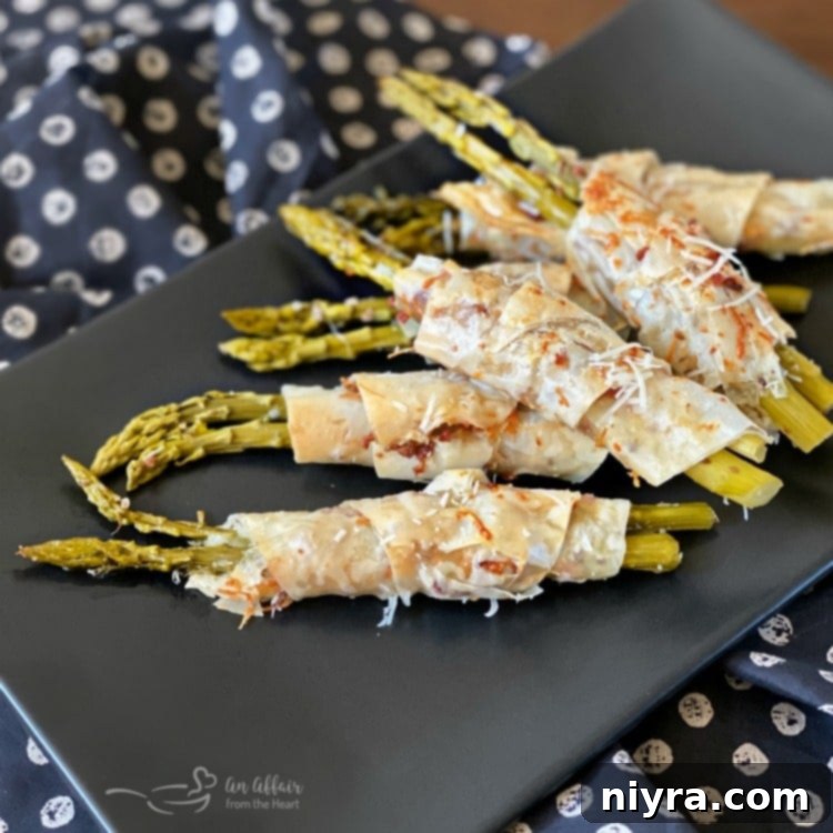 Square image of Bacon & Cheese Phyllo Wrapped Pickled Asparagus
