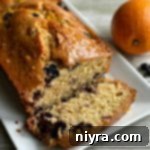Zesty Orange Blueberry Loaf 12 Blueberry Orange Bread sliced close up