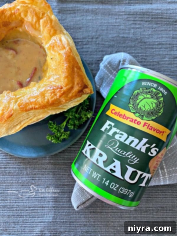 The Ultimate Reuben Pot Pie 5 Opened Reuben Pot Pies revealing the savory filling with Frank's Kraut